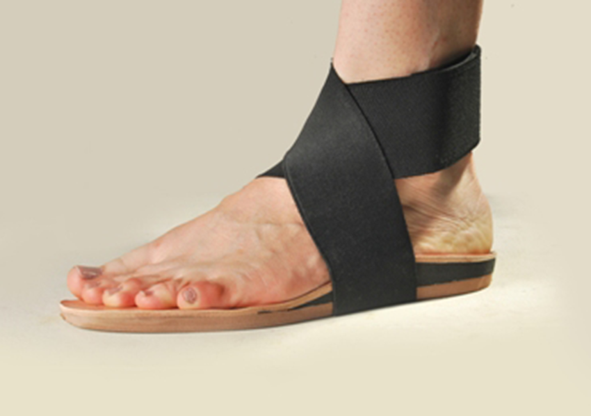 Lateral wedge insole with subtalar 